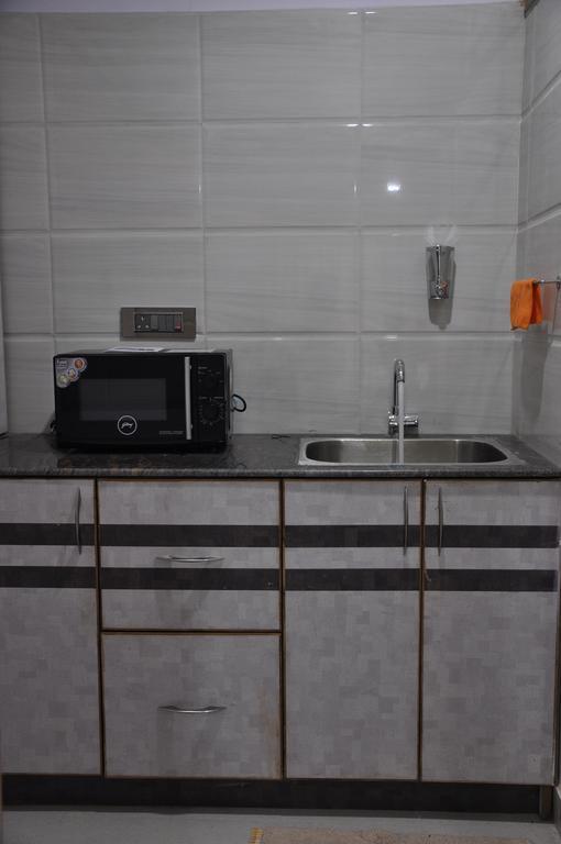 Hotel Av Comforts Bangalore Kamer foto